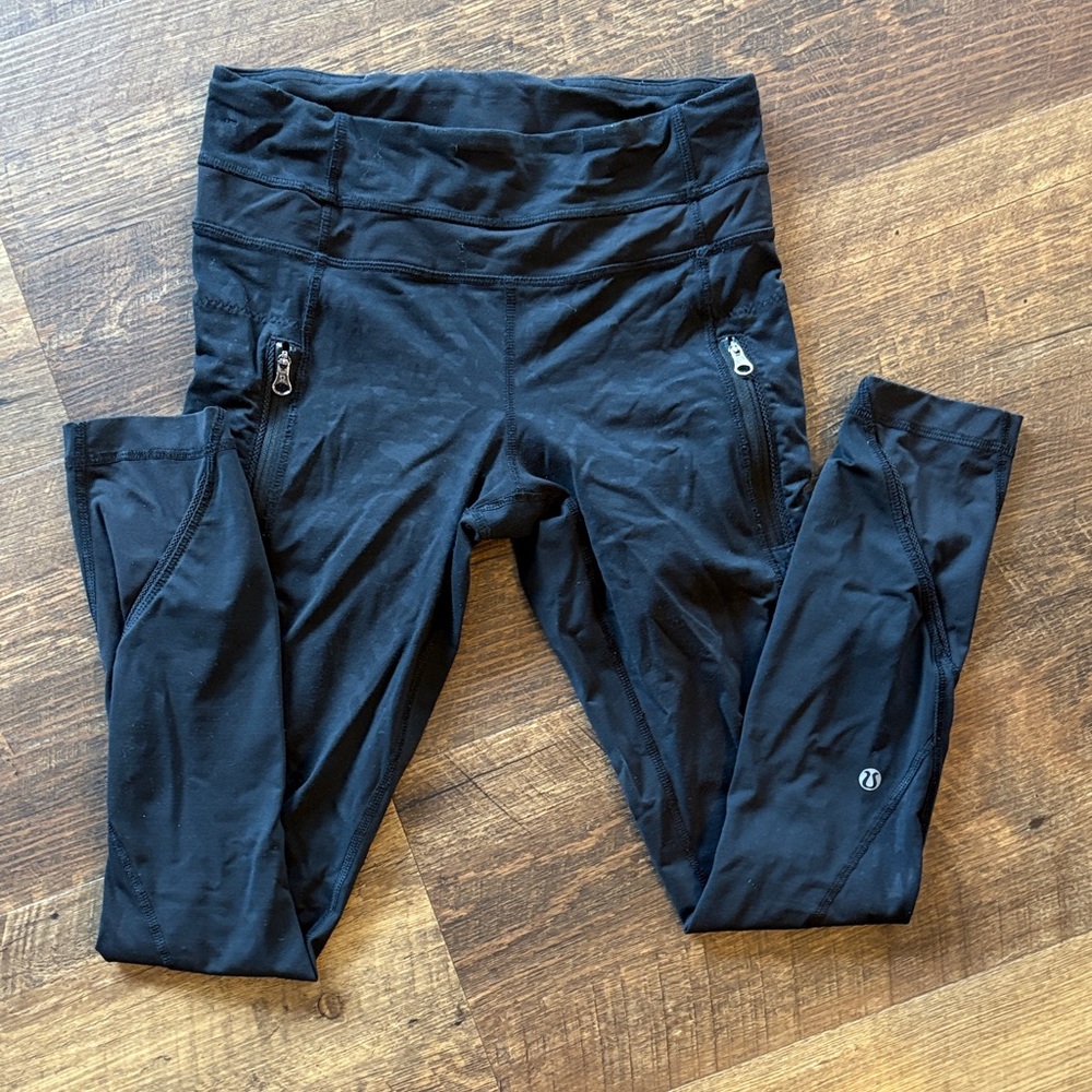 Lululemon Animal Print Black High-Waist Zip-Pocket Leggings
